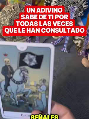 The cover image features a person holding a tarot card, with the text overlayed over the photo of the person holding the card. The card depicts a figure on a white horse on the right, with the words "SEÑALES" in yellow at the bottom of the card. The background shows other items, though it is hard to see what they are exactly.