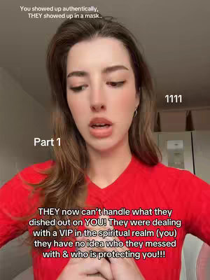 A woman with long brown hair wearing a red shirt looks directly at the camera with a serious expression. Text overlays on the image provide context. The background is muted, drawing focus to the woman.