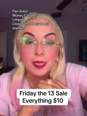 A selfie-style shot featuring a woman with blonde hair, wearing glasses and a pink top. She's looking at the camera with her tongue out. The background is slightly blurred, suggesting an interior setting. Overlayed on the image is a white banner with the text 'Friday the 13 Sale Everything $10'.