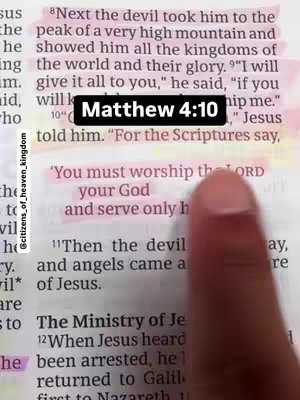 An image of an open Bible with the text highlighting the verse Matthew 4:10. A finger is pointing at the text.