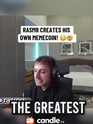 The image shows a man with headphones on, looking at the camera, with the text overlay "RASMR CREATES HIS OWN MEMECOIN!" in a white box above him. The background includes a room setting with a bed and framed pictures, and the logo for 'candle.tv' is visible at the bottom.