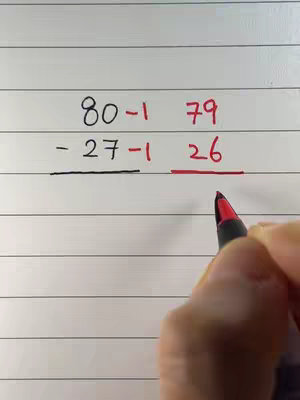 Image shows a white surface with horizontal lines, potentially paper. Black numbers and symbols are written to visually describe and provide the steps of a math problem, along with the solution's color in red. The bottom right corner contains an arm holding a pen.