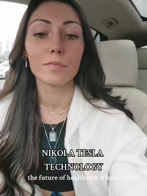 A woman with long dark hair is sitting in a car seat, looking slightly off-center. Text overlays the image, promoting "Nikola Tesla Technology".