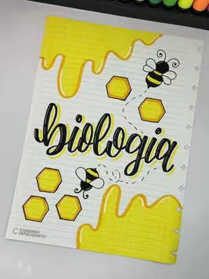 A notebook page with horizontal lines is the backdrop. On the page, the word "biologia" is written in large, black, cursive letters with a yellow outline. The word is adorned with yellow drips and cartoon bees. The composition uses a bright yellow and black color scheme on a white background.