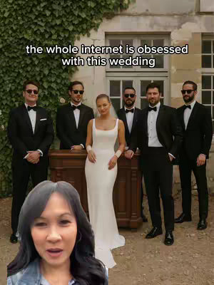 A vertical video cover shows a woman talking over a video that appears to be recorded at a wedding. She is in the bottom third of the image and in front of a group of formally dressed men and a woman in a white wedding dress.