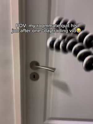 The cover image shows a slightly blurred interior scene, focusing on a white door with a silver handle and a keyhole. The blurred image is held by a small, black tripod