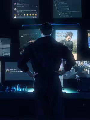 The image shows a dark, moody scene. A person stands with their back to the viewer in front of a wall of lit screens. The person is dressed in black with hands on hips. The screens display social media posts or similar content.