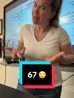 A woman stands in what appears to be a classroom, gesturing with her hands while facing the camera. Behind her is a projection screen with text and diagrams. A rectangular graphic overlay is placed over the bottom center of the frame, containing the numbers "67" in white text.