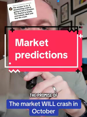 A man in a casual outfit holds a black object near his chest, in front of a large red banner with white text overlapping part of his face. A message in a speech bubble appears in the upper-left, seemingly responding to a comment. The background includes an array of framed pictures with warm lighting.
