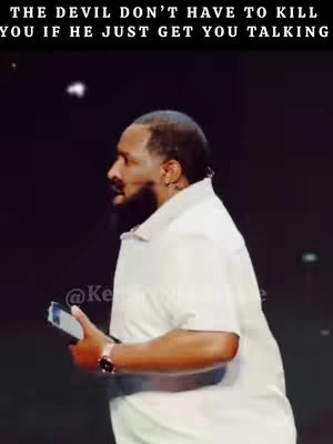 The image shows a man in a white collared shirt, speaking at a stage. Text overlays at the top.