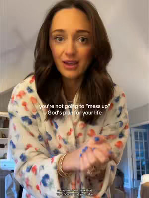 A woman in a floral print robe looks directly at the camera with a concerned expression. Text overlays the image.