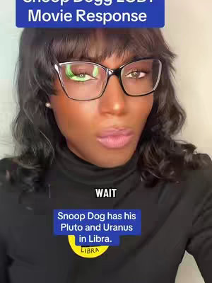 A close-up shot of a person with dark skin wearing glasses and a black turtleneck. Text boxes overlay the image, one blue box at the top reads 'Snoop Dogg LGBT Movie Response,' text in a smaller blue box closer to the bottom reads 'Snoop Dog has his Pluto and Uranus in Libra.'