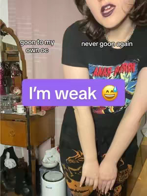 A young woman in a black t-shirt stands in her room, partially obscuring the foreground. A purple rectangle with the text "I'm weak" and a sweating smiley face emoji is obscuring some of the image. The background shows a cluttered room.