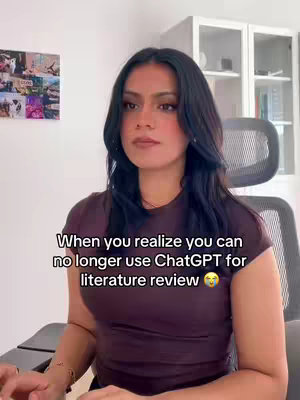A woman with dark hair is looking towards the side with a concerned look. The overlay text is located below her face and explains that she can no longer use ChatGPT for literature review.