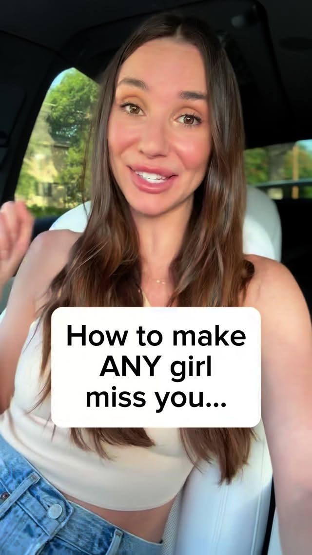 A woman is sitting in a car, smiling and looking at the camera. Overlay text in a white box says, "How to make ANY girl miss you..."