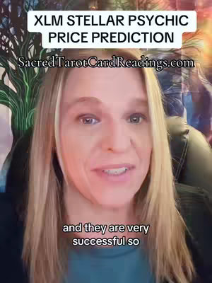 A woman with blonde hair and a green top is shown from the chest up, centered in the frame, talking directly to the camera. The background is blurred, featuring hints of a floral pattern, leafy branches, and a dim, warm light that gives the impression of a cozy, indoor setting. Text overlays at the top of the frame read "XLM STELLAR PSYCHIC PRICE PREDICTION" and "SacredTarotCardReadings.com." There is also a text overlay at the bottom of the frame that reads "and they are very successful so".