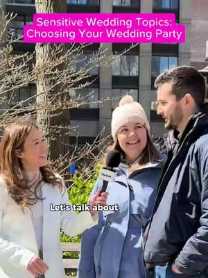 The image shows three people outdoors. A woman on the left is smiling and talking. In the middle, another woman is holding a microphone and speaking as well, with a man on the right also looking towards the camera. Behind them is a blurred background of trees and buildings.
