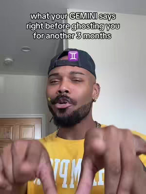 A man with a beard is positioned in front of a light-colored wall, appearing to address the viewers. Overlayed on the top is text that reads, 'what your GEMINI says right before ghosting you for another 3 months'. He wears a black cap, with a purple symbol attached to the front, a yellow shirt and has his fingers pointed downward, towards the viewer.