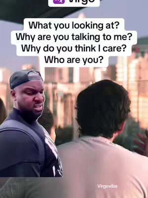 The image is of an individual looking to the side in the left of frame with a second person in the frame right and additional visible text overlayed.