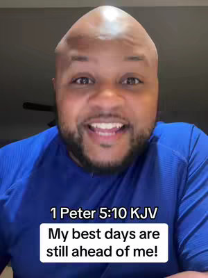 A close-up shot of a man with a bald head, smiling and looking directly at the camera against a blurred background. Text overlay at the bottom of the frame.
