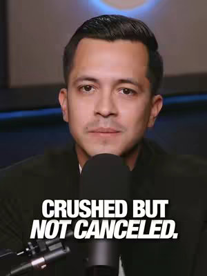 A close-up shot featuring a man with dark hair and a groomed appearance. He gazes directly at the camera with a neutral expression. Below the man, bold white text overlay reads "CRUSHED BUT NOT CANCELED."