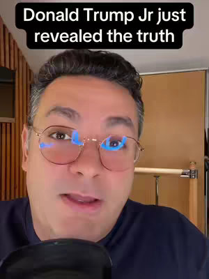 Close-up of a man wearing glasses, set in a domestic environment with wood paneling visible. The image focuses on the man's face, with text overlaid at the top.