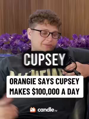 The cover image features a man with glasses, centered and slightly off-center, in front of a blurry purple floral backdrop. Text overlays in white and black boxes state, "CUPSEY" above and "ORANGIE SAYS CUPSEY MAKES $100,000 A DAY" at the center. The candle.tv logo appears below.