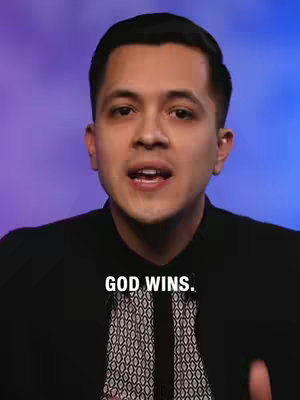The cover image shows a man in a dark suit jacket, an open-collared shirt. The background is a gradient of purple and blue. The text overlayed says 'GOD WINS.'
