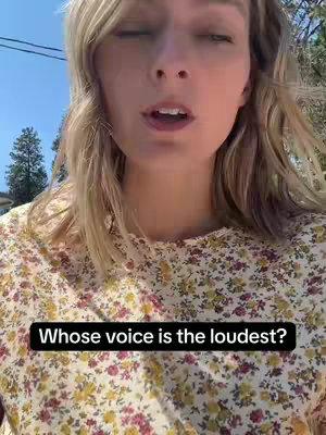 A woman with blonde hair and a floral top is looking towards the camera. Text in a black box overlay at the bottom reads: "Whose voice is the loudest?"