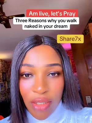 A woman with long black hair is centered in a selfie-style shot. Above her head, a red banner reads "Am Live, let's Pray". Below, a white text box states, "Three Reasons why you walk naked in your dream." The woman's face is well-lit, with bright eyes and full lips. A "Share7x" sticker is on the right. The background is blurred, suggesting an interior decorated in warm tones.