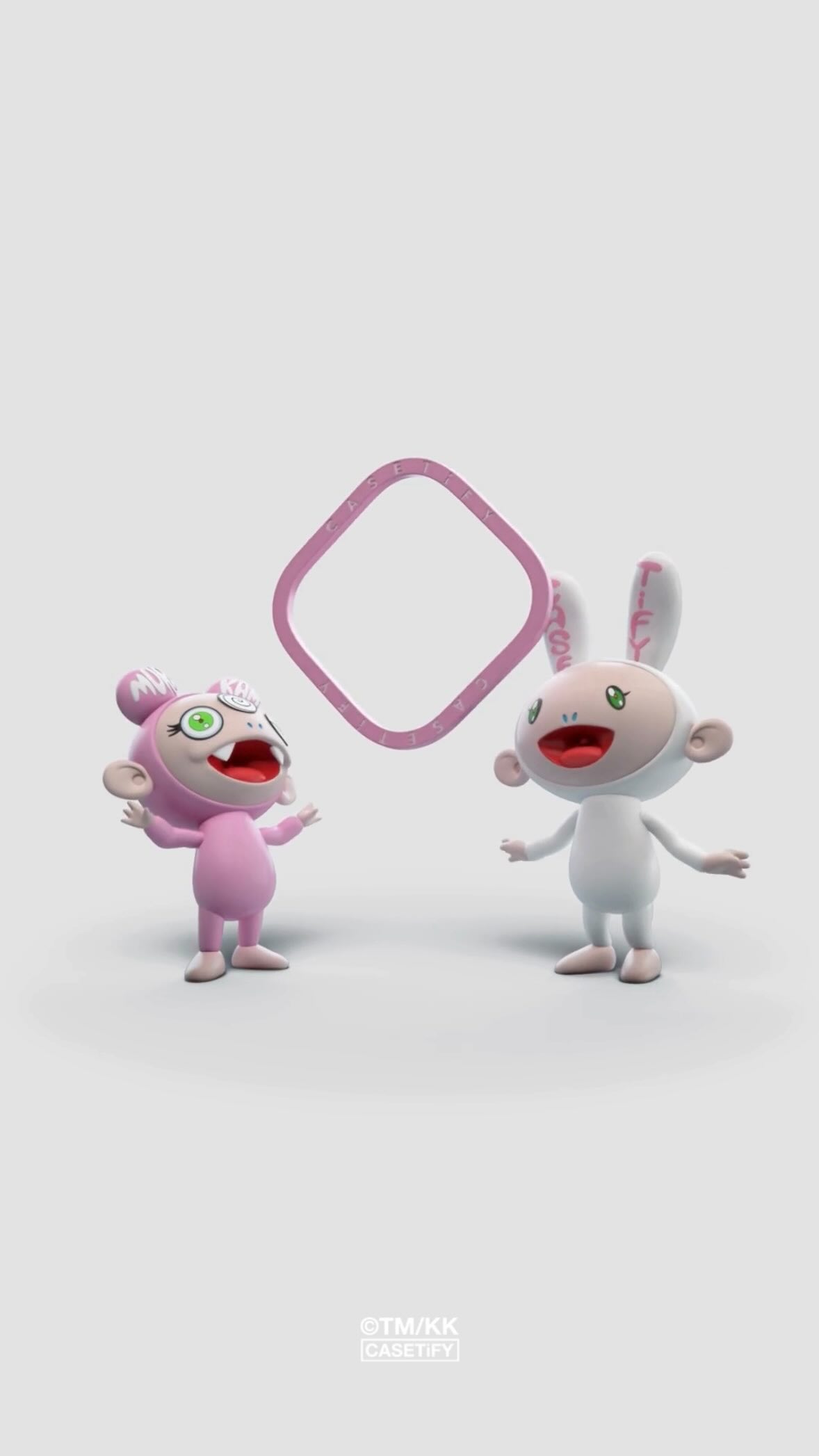 The image features two cartoon figures, Kaikai and Kiki, standing against a solid white background. Kaikai is a pink figure wearing a pink outfit and a head covering, and Kiki is a white figure. A pink, diamond-shaped frame with curved edges floats behind the figures.
