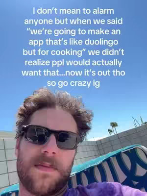 A selfie taken from a low angle shows a man with brown hair, wearing sunglasses and a purple shirt, against a bright blue sky. Text is overlaid on the image.
