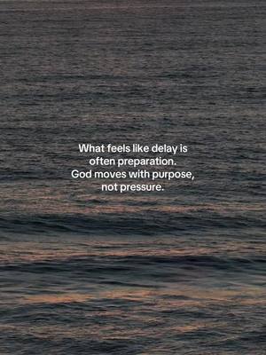 The image shows a view of the ocean with text overlayed. The water is a deep, grayish-blue, and the surface is slightly rippled, catching the light. The text is white and centered, providing a message on preparation and purpose, contrasted against pressure. Overall, the image has a calm and reflective tone.