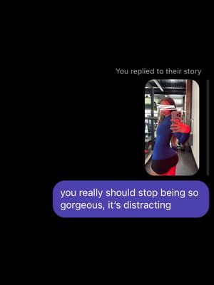 The image is a screenshot of a social media story reply. It features a selfie-style photo within the frame of a phone screen. The setting appears to be a gym as exercise equipment is visible in the background. The framing suggests the person is taking a selfie with their phone and also shows the contents, with the message bubble appearing at the base.