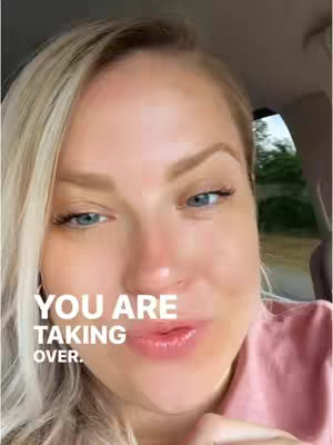 A close-up shot of a fair-skinned woman with blonde hair and blue eyes, likely in a car. The woman is smiling, and a text overlay says, 'YOU ARE TAKING OVER.'