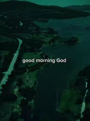 An aerial view of a landscape is shown, featuring a body of water surrounded by land and roads with text overlayed in the center.
