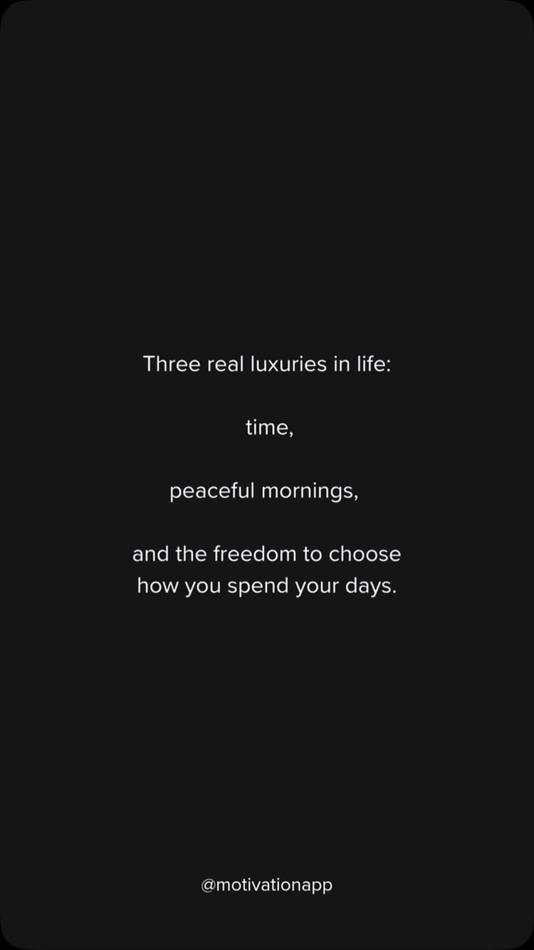 The image is a simple design with a black background. Centered on the screen is white text with the phrase 'Three real luxuries in life:' followed by a list of three things: 'time,' 'peaceful mornings,' and 'the freedom to choose how you spend your days.' At the bottom of the image, the handle '@motivationapp' is displayed.