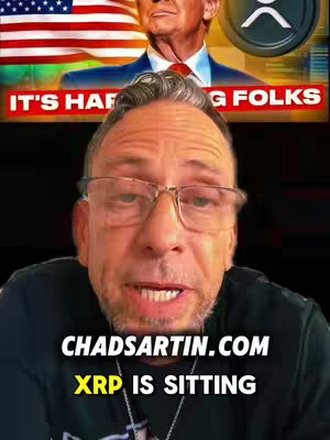 A man wearing glasses is centered, looking directly at the camera. Behind him, a screen shows a split image: the top half displays the American flag and a person, while the bottom half has a cryptocurrency logo. Text overlays are present.