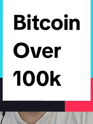 The cover image displays bold white text against a colored background. The text reads 'Bitcoin Over 100k'. Below the text, a portion of a person wearing a white shirt is visible.