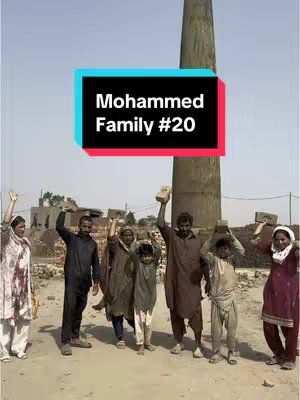 A group of people, presumably a family, standing in a sunlit, dusty environment. They are holding up bricks with arms raised. A rectangular text overlay at the top reads "Mohammed Family #20". A tall brick structure looms in the background. The overall scene looks like a brick factory.