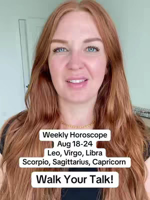 A medium shot shows a woman speaking directly to the camera. She has long, wavy auburn hair and fair skin that is lightly made up, with a gold necklace.  The background is blurred, suggesting an interior setting. Text overlays with a white background and black font are placed near the bottom of the screen and summarize content.