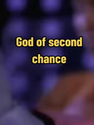 The cover image features a blurred background with bokeh effects in shades of purple. Overlaid on this is a large, centered text that reads "God of second chance" in a bold, yellow font with a black outline.