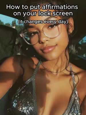 The cover image features a young woman in a car, wearing glasses and a sparkly top with text overlayed at the top which says: "How to put affirmations on your lock screen (it changes every day)". The woman has a pleasant expression and is looking at the camera.