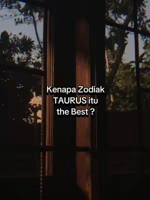 The cover image uses a vertical orientation. The background appears to be a window frame with a view of the outside, which consists of tree branches. Overlaid on the background is text in white, which poses the question "Kenapa Zodiak TAURUS itu the Best ?"