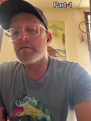 A man wearing glasses, a cap and a t-shirt is centered in the image and looks at the camera. The text "Part-1" is positioned at the top right.