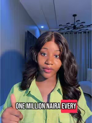A woman in a green shirt is shown from the chest up, giving a thumbs-up. Text overlayed in a red rectangle reads, "ONE MILLION NAIRA EVERY". The background is a room with a blue-toned wall, a dark door and a chandelier.
