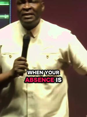 The image shows a man holding a microphone, likely speaking at an event. Text overlayed on the image reads, "WHEN YOUR ABSENCE IS". The background is a dark red or burgundy color.