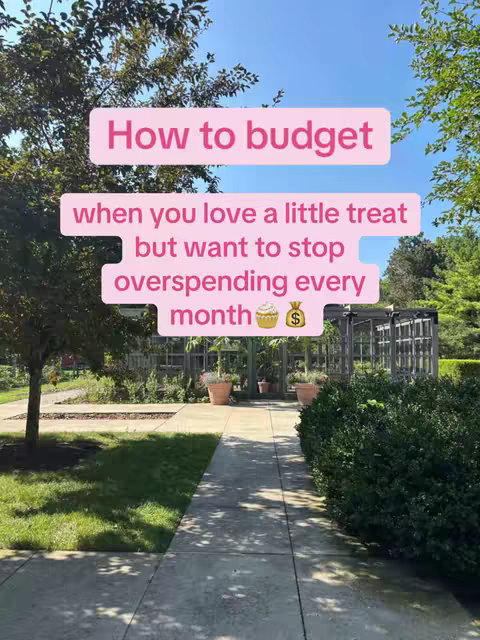 The image captures a sunny outdoor scene with a groomed pathway leading towards a covered structure. The pathway is bordered by grass and lush greenery. Overlayed are text boxes with pastel pink backgrounds and white text. These text boxes display the title "How to budget" and then elaborate on the topic. Decorative elements like a cupcake and a money bag icon have been added.