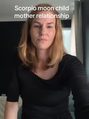 A woman with blonde hair, dressed in a black top, is positioned in front of a window with soft daylight filtering through. The upper portion of her is visible, with text overlay positioned above her, framed in a medium shot, with a calm expression.