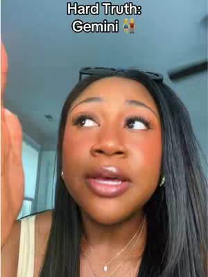 A close-up shot of a person with long, dark hair looking upwards, mouth slightly open as if speaking. Sunglasses rest on top of their head. Overlay text at the top reads, "Hard Truth: Gemini 👯".